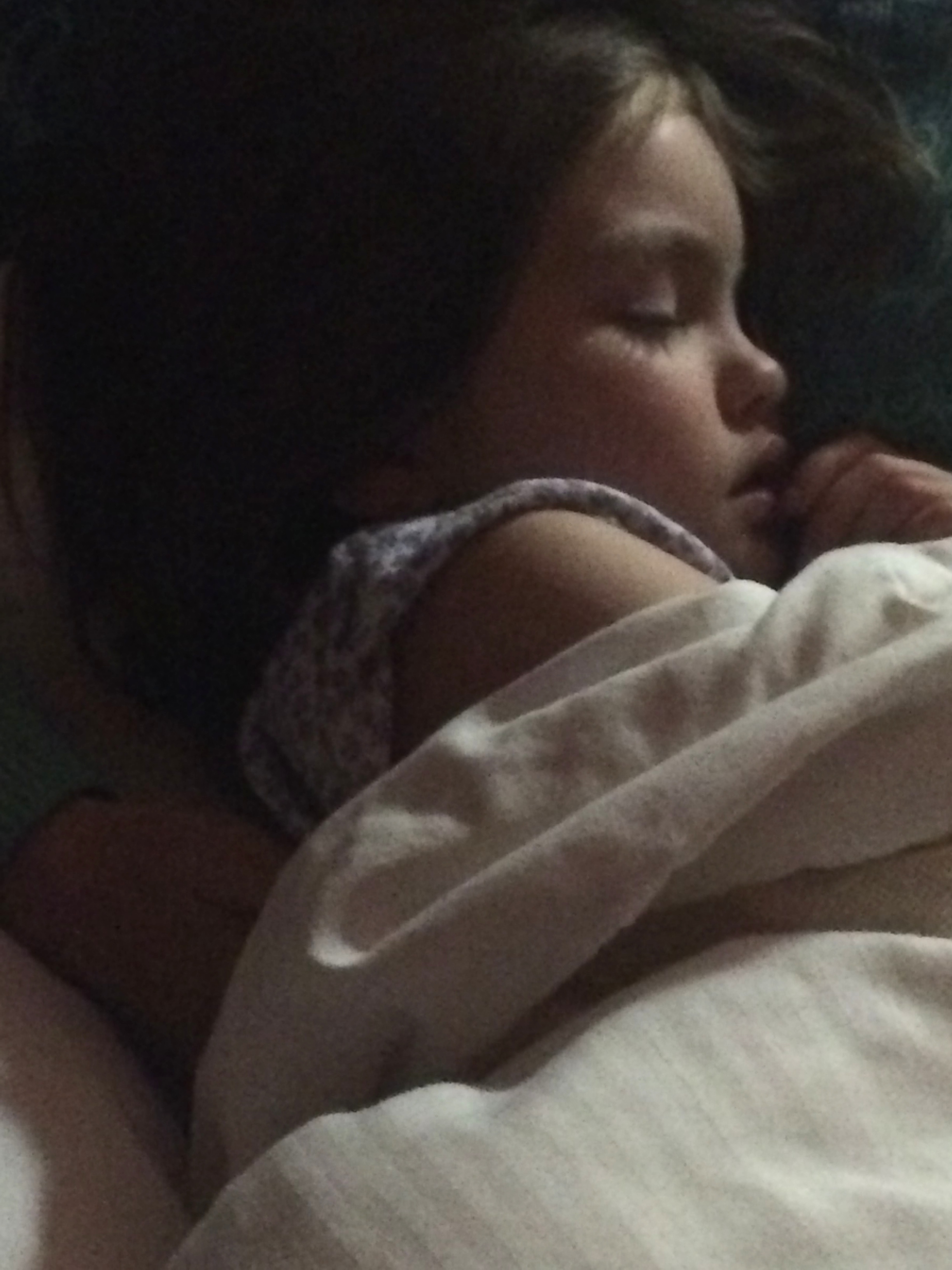 I wasn't going to include this in the post but there was something so peaceful about it that I am adding it at the last minute.  I snapped this pic after Liadan practically passed out that night.  We were very happy to have her lying there next to us (she crashed in our bed that night).  