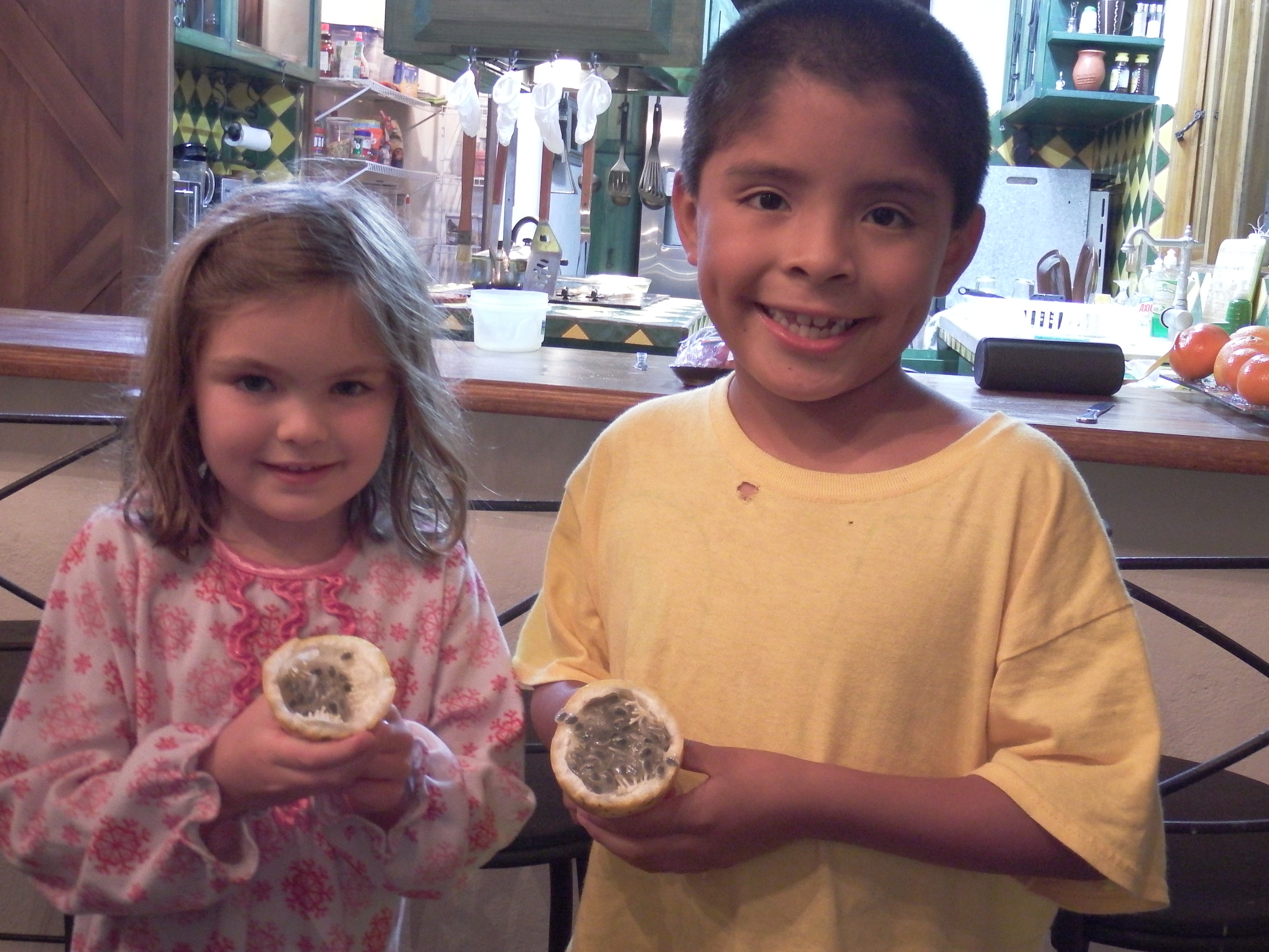 Charlie and Lulu with Granadillas (I have to admit I couldn't bring myself to try them..they look even less appetizing up close.)