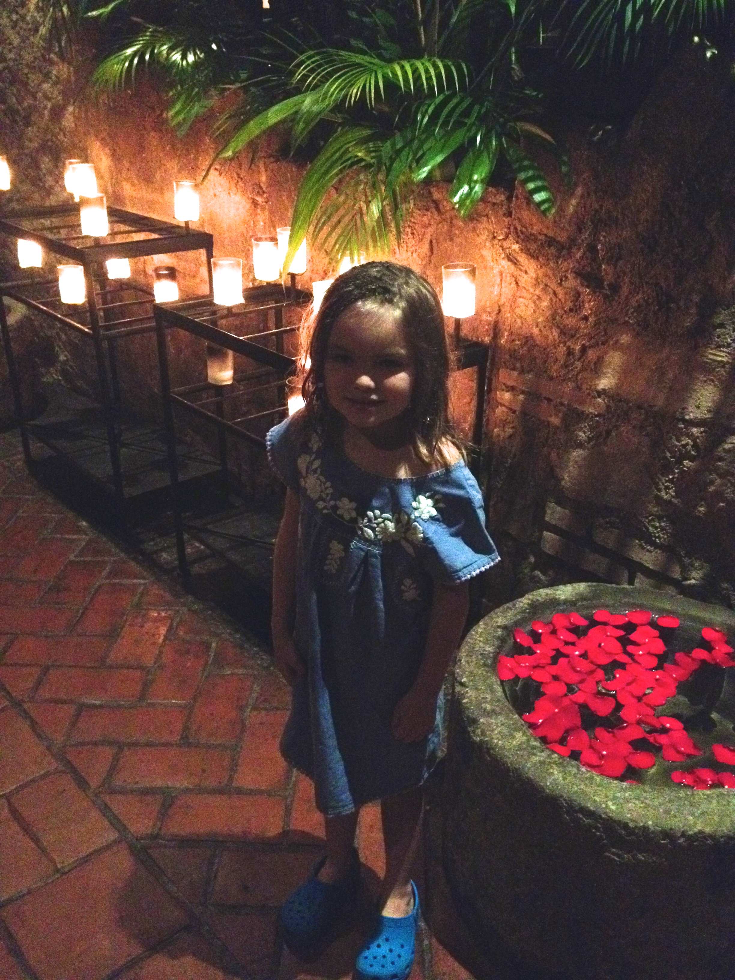 In the "hallway" (all outdoors with a veranda cover over it) at night.