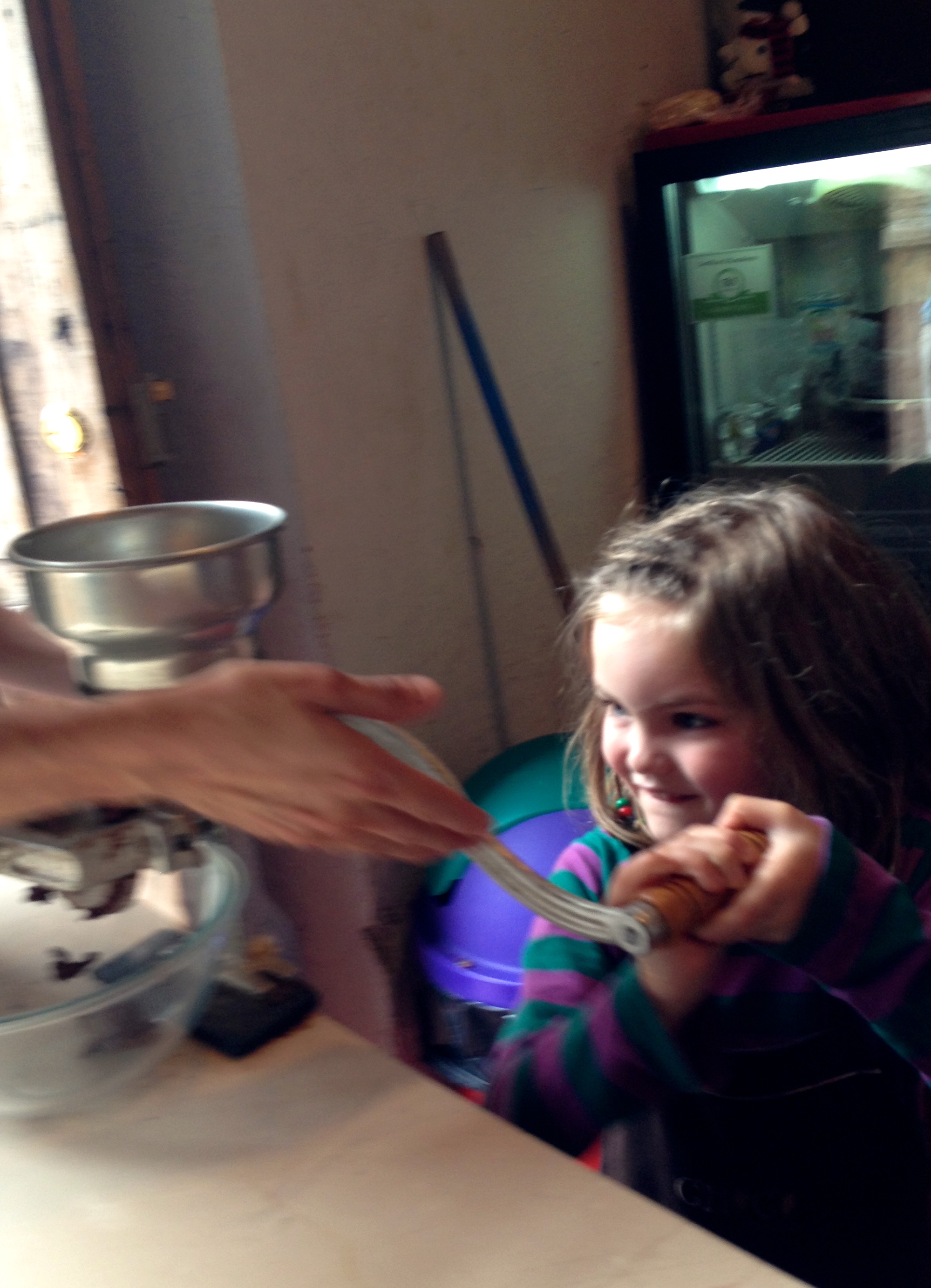 Hell-bent on turning that crank HERSELF.