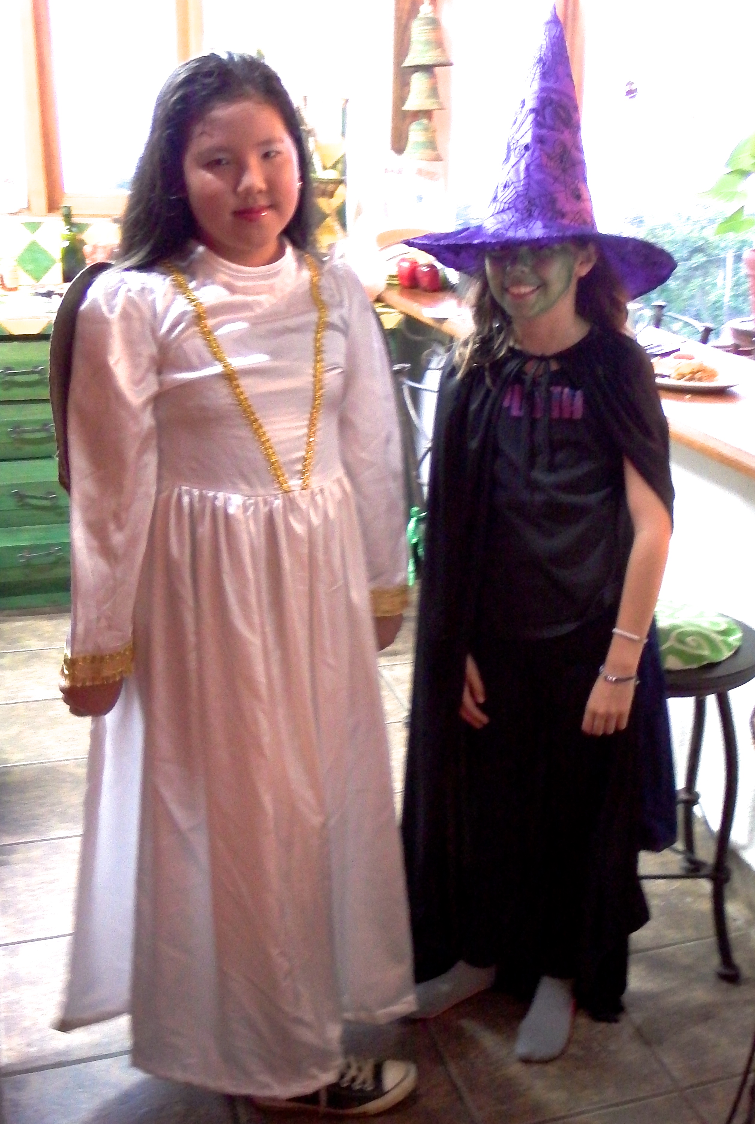 Ella and her friend Kala at the house before the school Halloween party