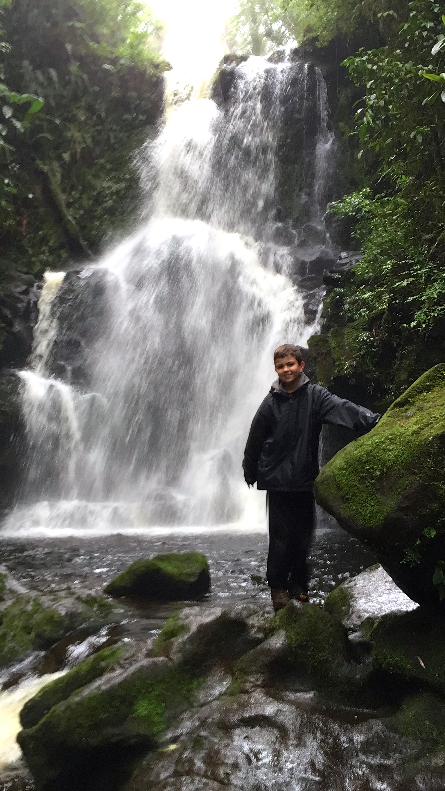 Jack at a waterfall he discovered with Tom while on a hike in CR 