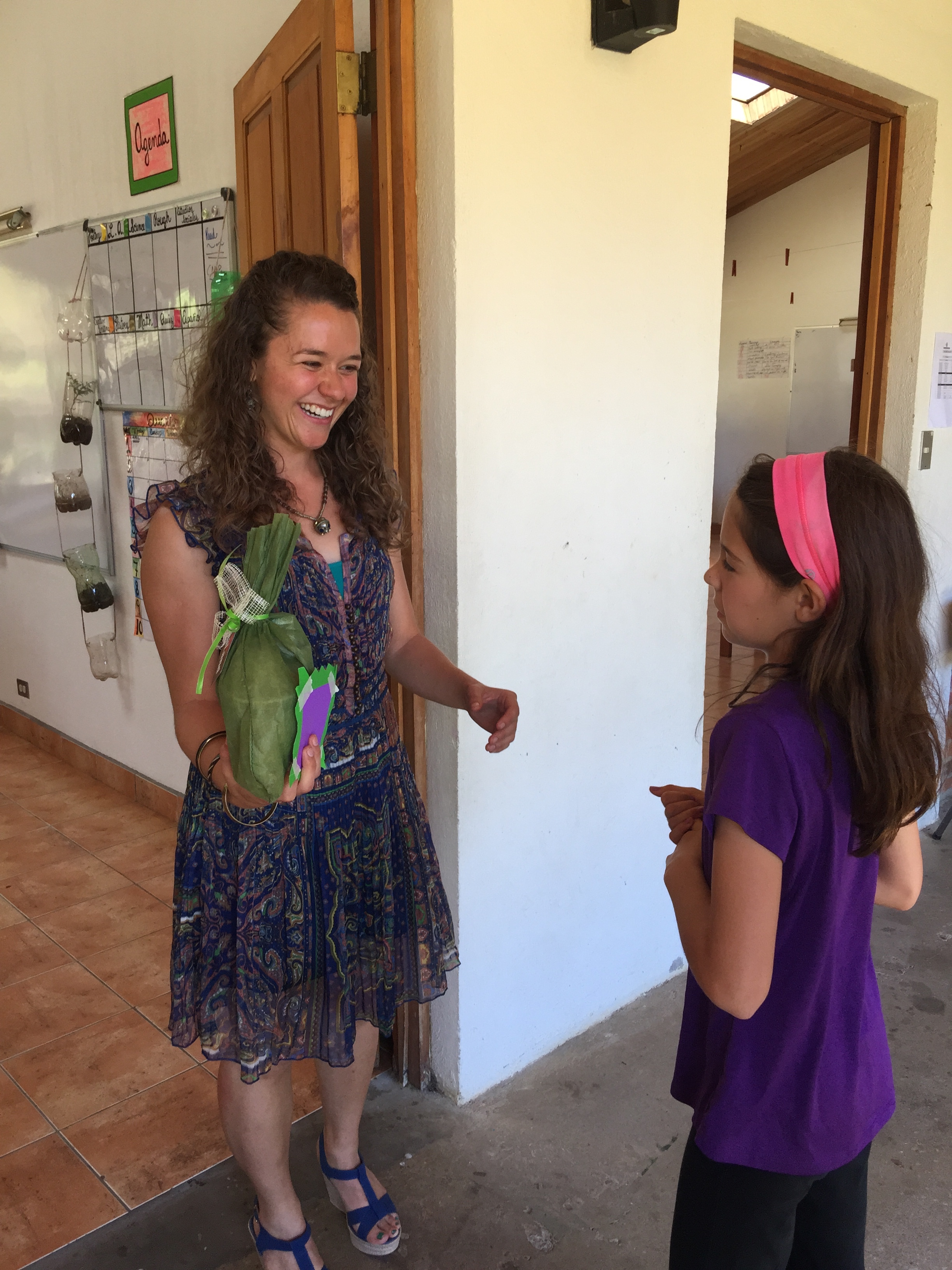 Ella saying goodbye to her teacher (Miss Maria)