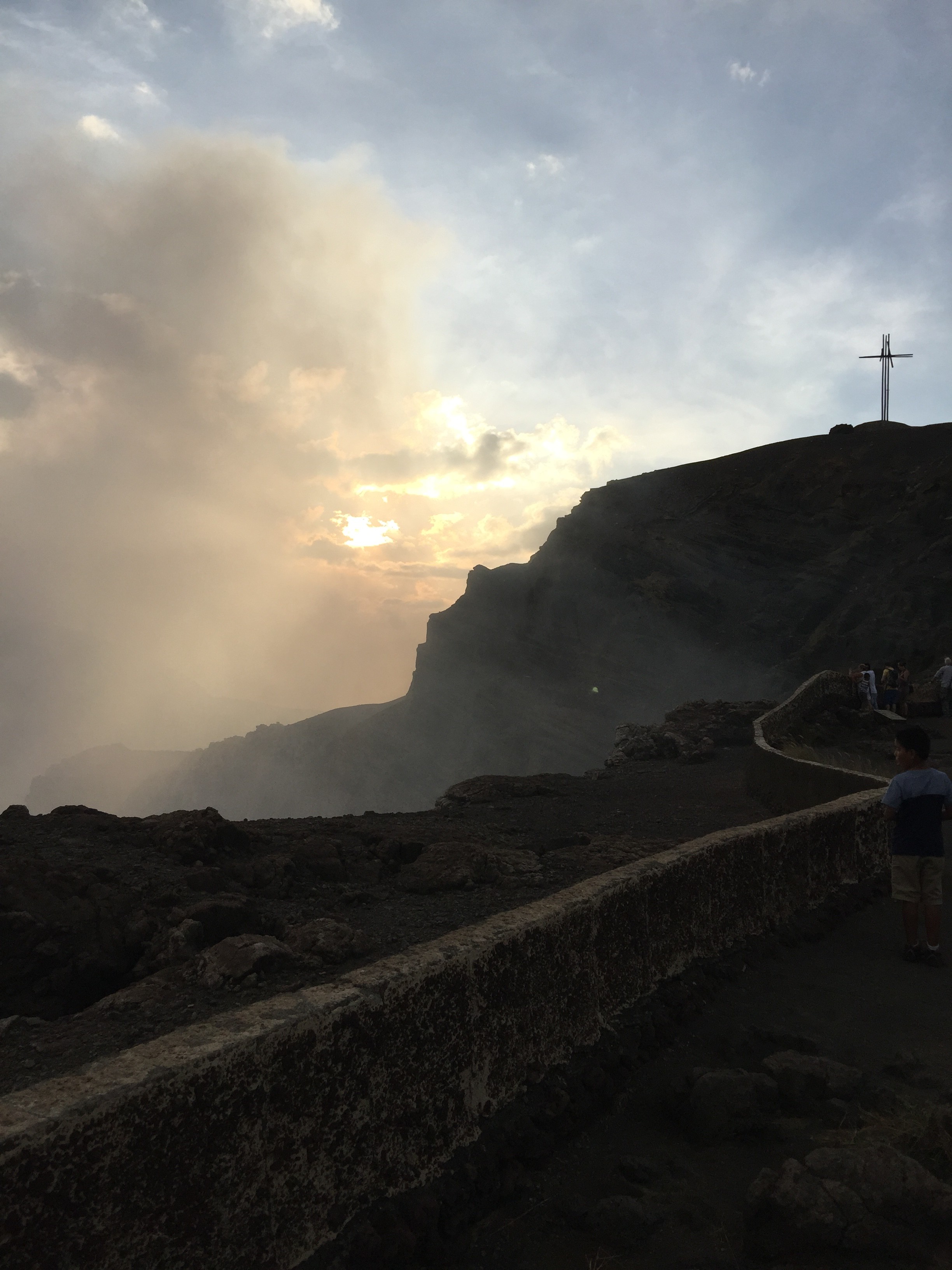 Smoke coming up from the crater (with recreation of the original "Cross of Masaya" in the background)