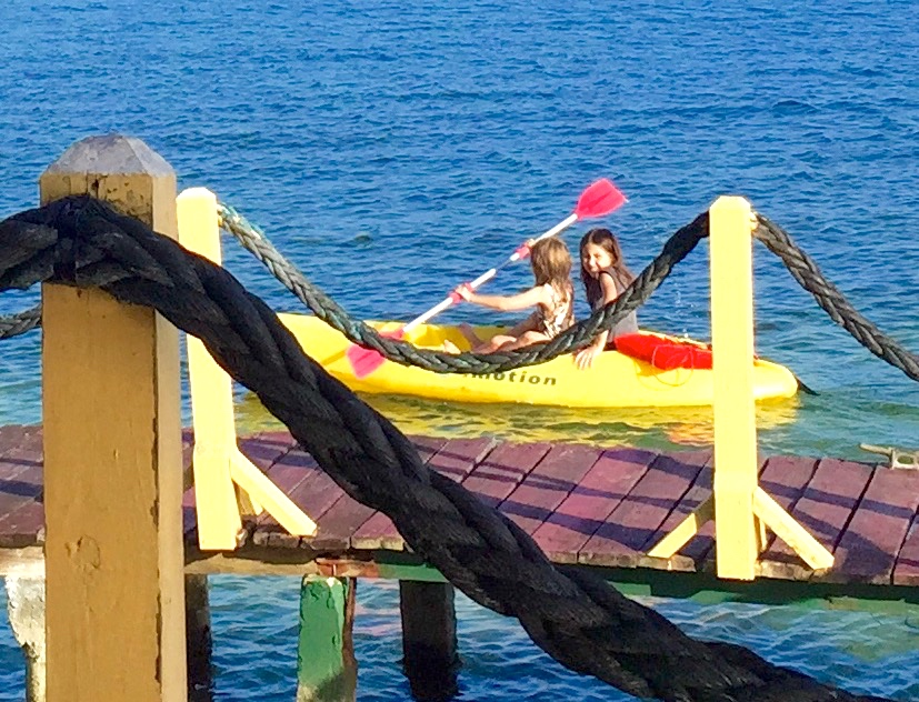 I let Liadan sit on my lap and taught her to kayak too.