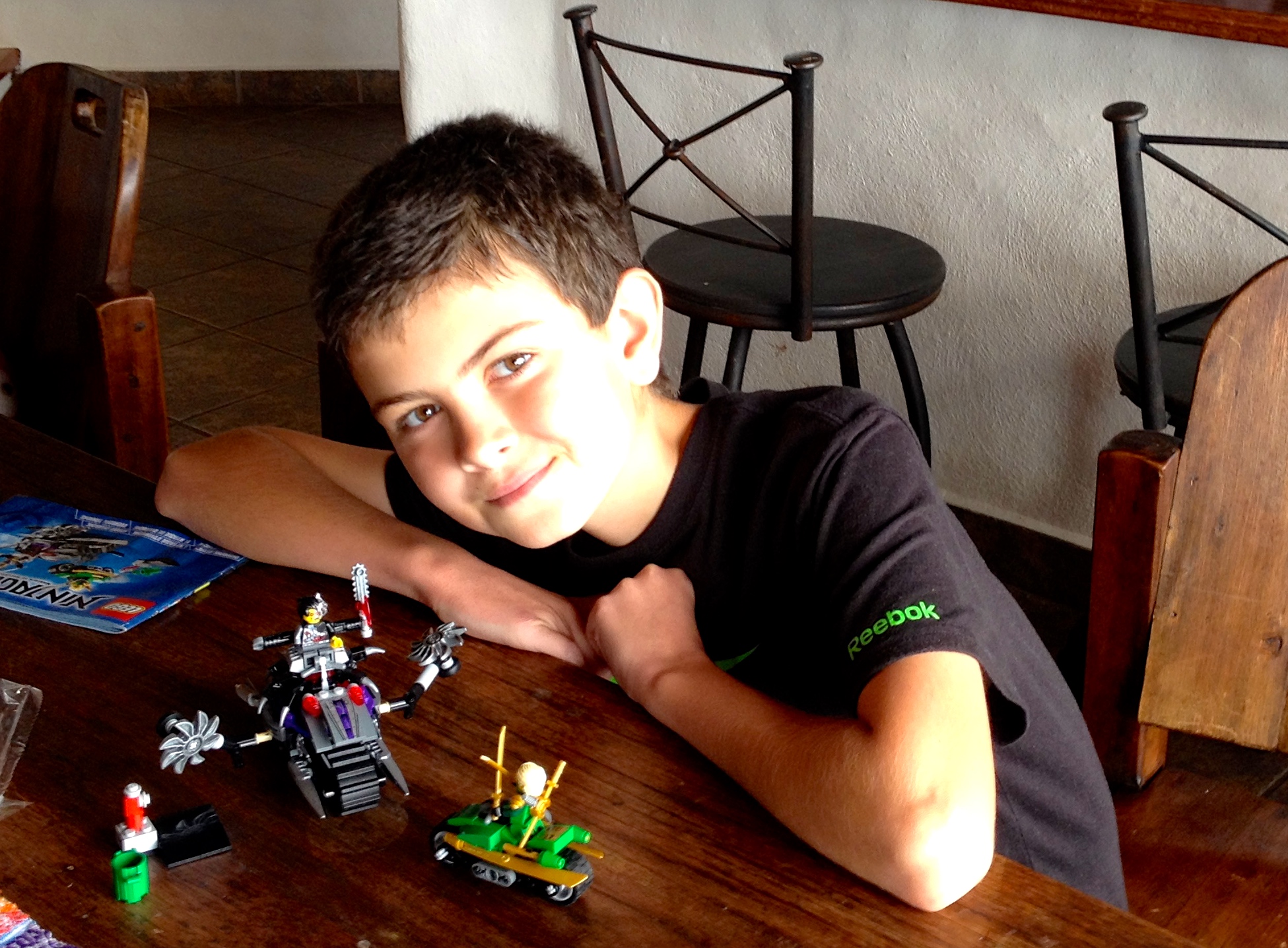 Jack puts together a lego kit...